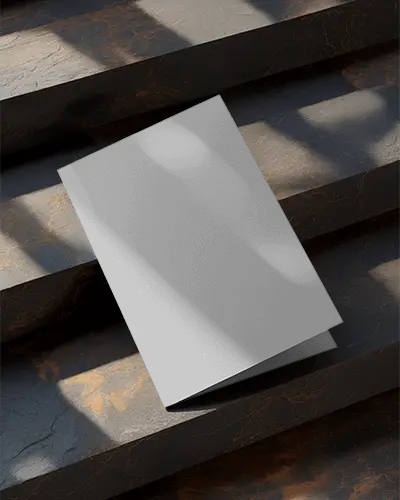 elegant-blank-brochure-mockup-on-textured-layers-with-realistic-light-and-shadow