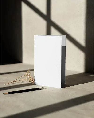 standing-bifold-brochure-mockup-layout-with-realistic-light-and-shadow-effects