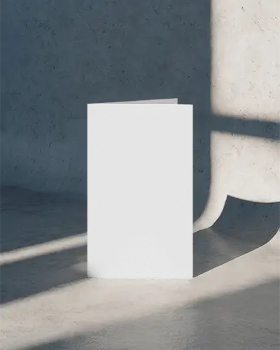 modern-brochure-mockup-standing-with-long-shadow-on-concrete-surface-for-design-presentation