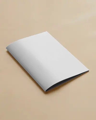 clean-brochure-mockup-laying-on-neutral-beige-surface-with-soft-even-light
