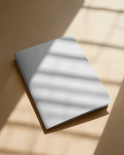 stylish-brochure-mockup-closed-with-window-shadow-effect-on-light-brown-surface