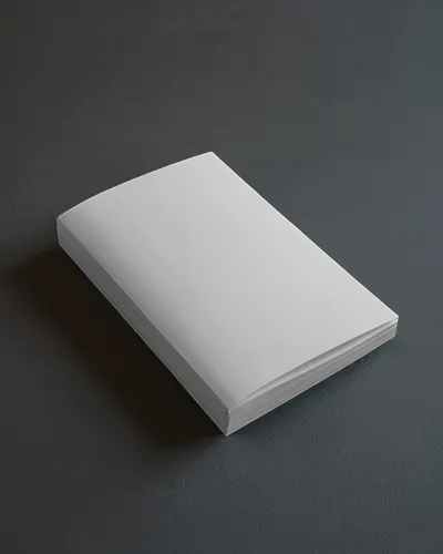 stacked-brochure-mockup-on-dark-surface-with-moody-natural-light