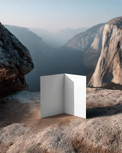 open-brochure-mockup-with-natural-mountain-background-and-rough-rock-texture