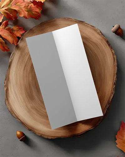 Clean Minimal Brochure Mockup On Natural Wood Surround With Acorns And Autumn Leaves