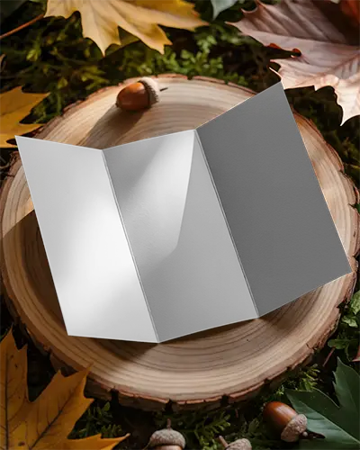 Open Trifold Brochure Mockup Laying On Wood Surface Surrounded By Fall Nature Elements