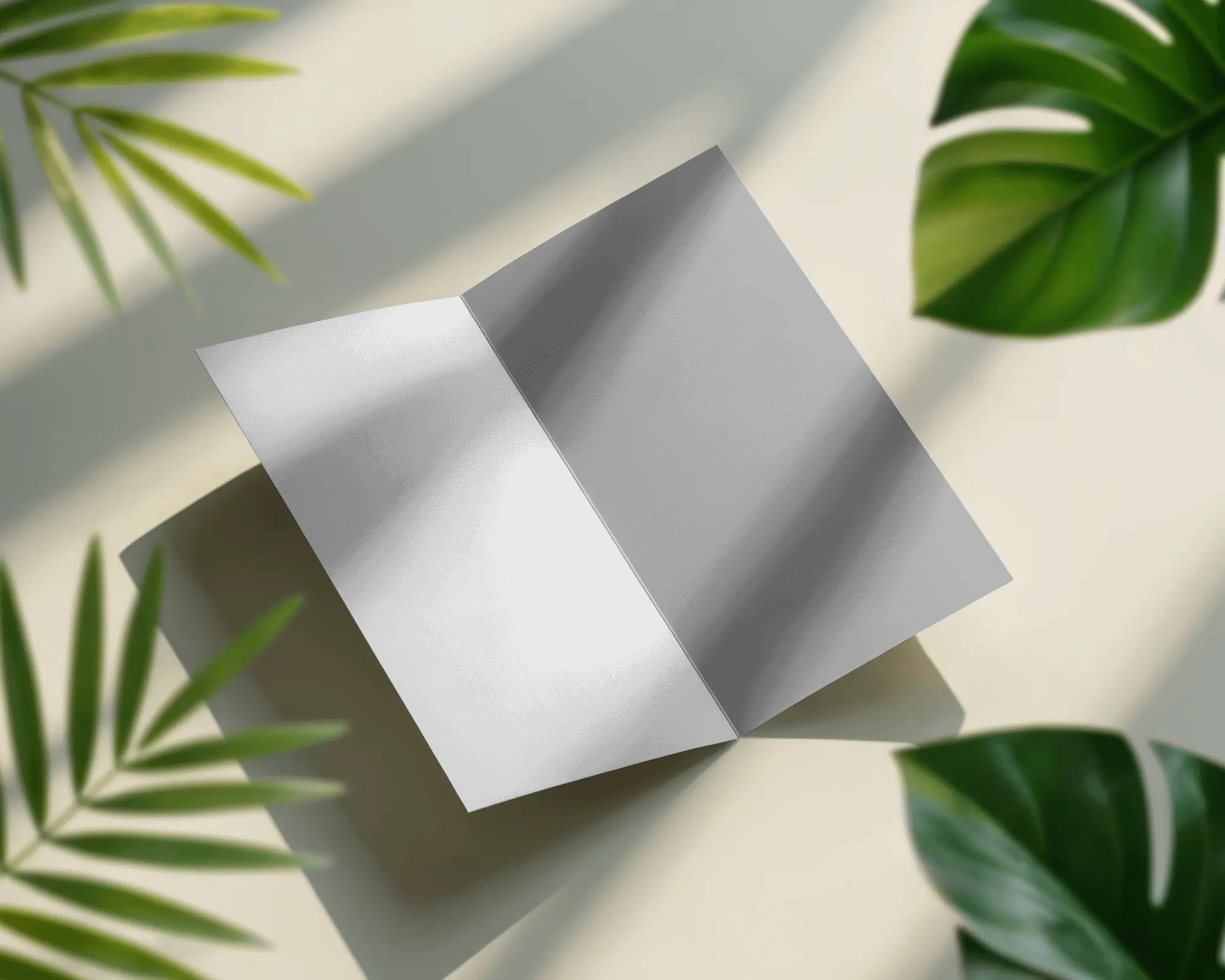 Stylish Clean Brochure Mockup Overlayed By Soft Light And Surrounded By Greenery