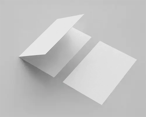 Sleek Brochure Mockup Floating Bifold Paper And Single Page Display On Light Gray Surface