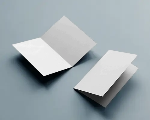 Dual Brochure Mockup Bifold With Open And Closed Views On Soft Blue Surface Minimal Studio