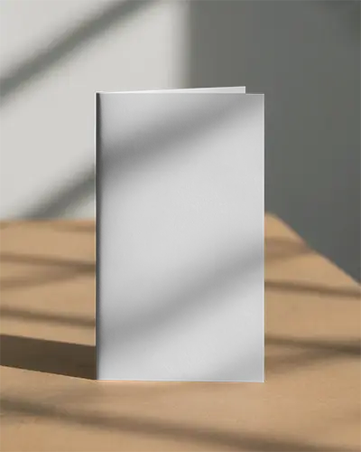 Paper Brochure Mockup In Upright Position Showcasing Clean Design And Light Play