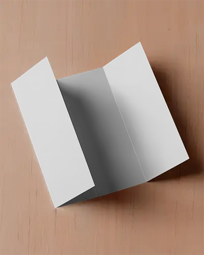 Realistic Open Trifold Brochure Mockup Isolated On Natural Wood Surface For Design