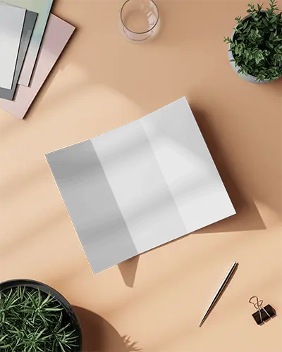 Top View Brochure Template Mockup With Natural Light Shadow And Desk Accessories