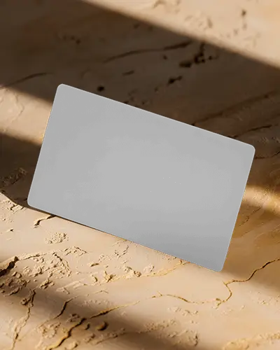 Horizontal Business Card Mockup Angled View On Beige Textured Surface With Light Shadows