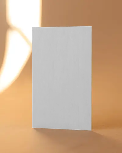 Elegant Vertical Business Card Mockup Standing On Warm Beige Surface With Sunlight Glow