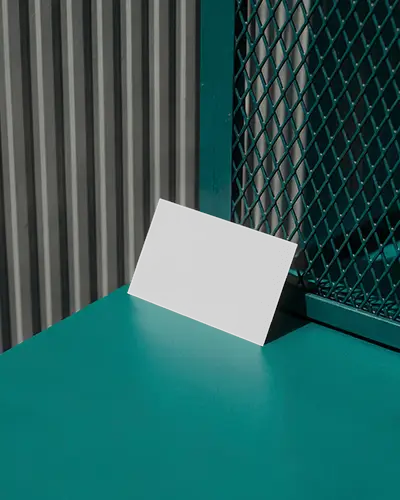 Urban Business Card Mockup Against Green Metal Grid And Industrial Striped Wall Textures