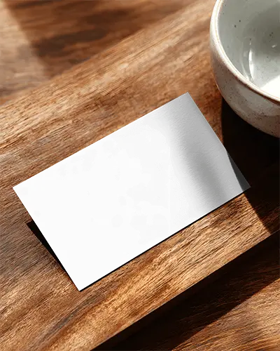 Elegant Horizontal Business Card Mockup With Ceramic Accessory On Textured Wooden Table