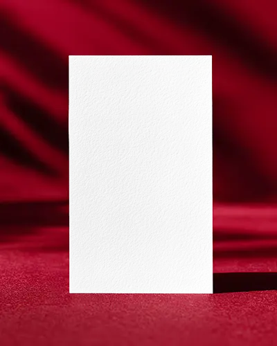 Vertical Business Card Mockup On Red Fabric Background Bold And Elegant Presentation