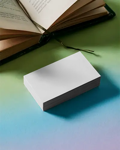Creative Reading Business Card Mockup Stack Placed Beside Open Book On Gradient Surface