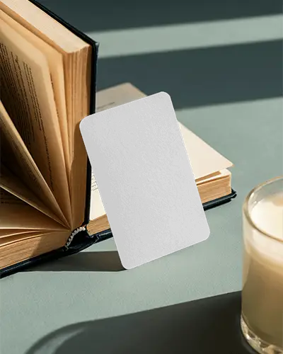 Cozy Reading Business Card Mockup Vertical Card Leaning On Open Book With Milk Glass Nearby