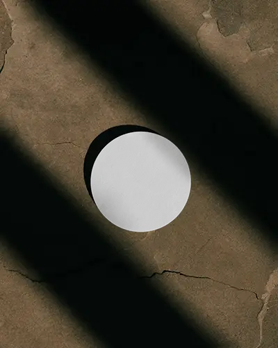 Dramatic Shadow Circle Business Card Mockup On Rustic Floor With Texture Depth