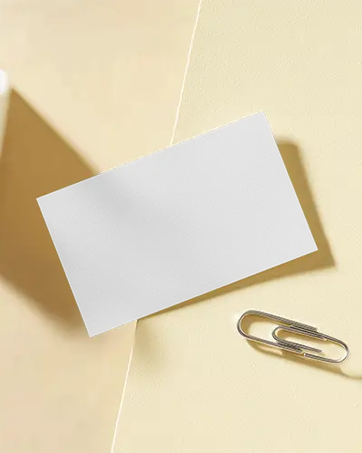 Yellow Toned Paper Clip Business Card Mockup Modern Stationery Scene Clean Lighting Professional