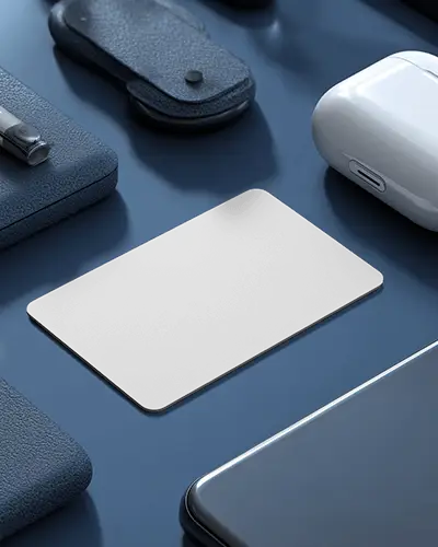 Stylish Rounded Horizontal Business Card Mockup On Blue Desk With Tech Gadgets Wallet And Airpods