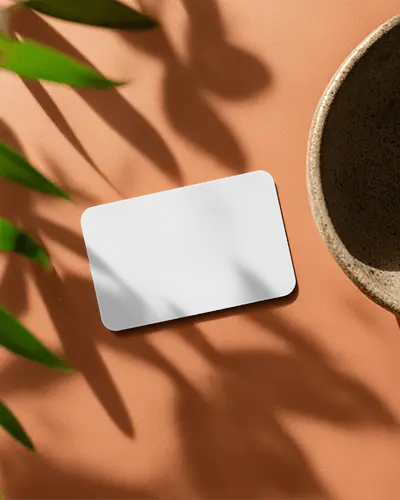 Soft Shadow Rounded Business Card Mockup On Orange Background With Ceramic Bowl And Leaves