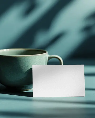 Elegant Business Card Display On Table With Cup And Soft Shadows Background