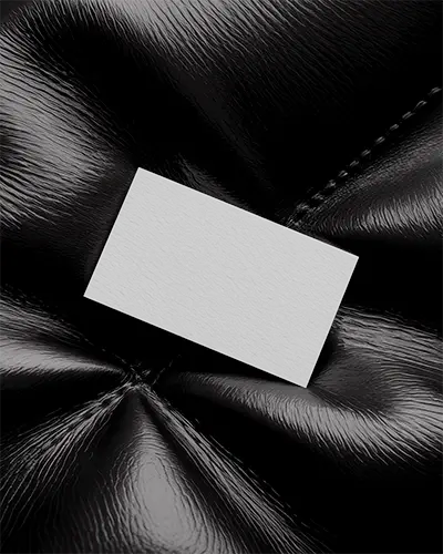 realistic-horizontal-business-card-mockup-on-folded-leather-texture-background