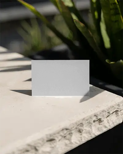 business-card-mockup-on-natural-stone-surface-with-sharp-sunlight-shadow-contrast
