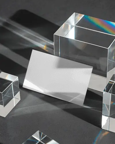 Reflective Business Card Mockup Surrounded By Glass Prisms With Colorful Light Refractions