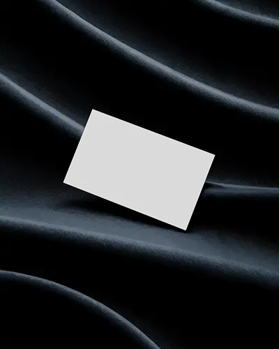 Fabric Textured Horizontal Business Card Mockup Placed On Dark Satin Cloth Stylish And Luxurious