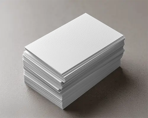 Stacked Rectangular Business Cards With Prominent Texture On Table Mockup