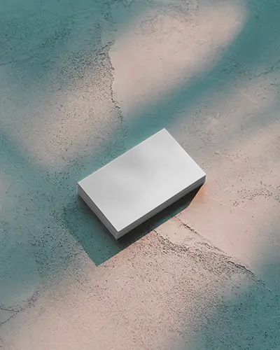 Textured Floor Business Card Mockup Blue And Beige Tones Soft Shadows Stylish Layout