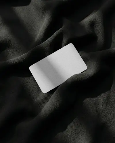 Halloween Business Card Mockup On Wooden Surface With Jack O Lantern Light And Dry Leaves