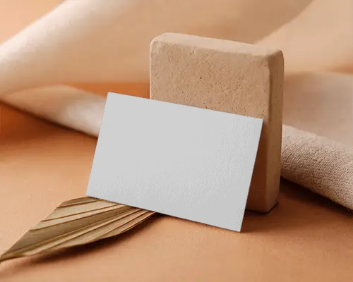 Professional Horizontal Business Card Mockup Standing Against Textured Background In Nature