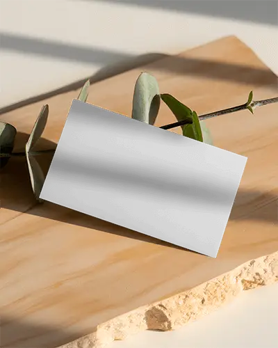 Modern Minimal Business Card Mockup On Stylish Wooden Surface With Greenery Element