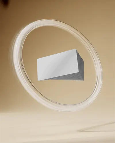 floating-business-card-stack-mockup-inside-glowing-ring-on-soft-gradient-beige-background
