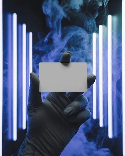 neon-lit-studio-business-card-mockup-black-gloved-hand-holding-card-amid-blue-smoke