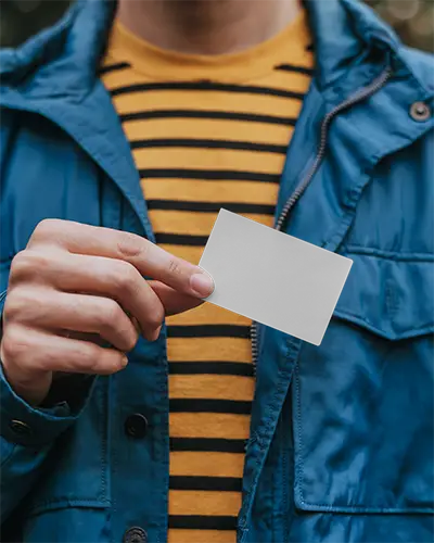 Person Holding Business Card Mockup For Branding And Marketing Presentation