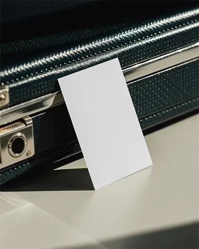 Vertical Business Card Mockup Standing Attached To Industrial Metal Briefcase Closeup Angle