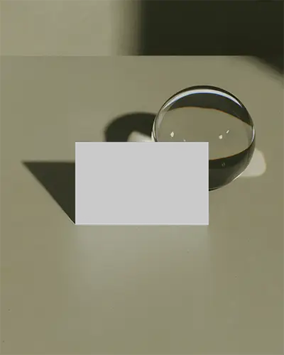 clean-business-card-layout-with-transparent-glass-sphere-soft-shadow-professional-style