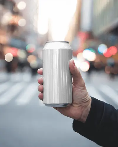 Street Scene Can Mockup Handheld With Busy Blurred Urban Crosswalk And Bokeh Night Vibe