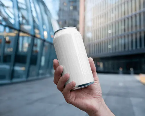 Futuristic Architecture Can Mockup In Hand With Modern Glass Reflection And Clear Sky City