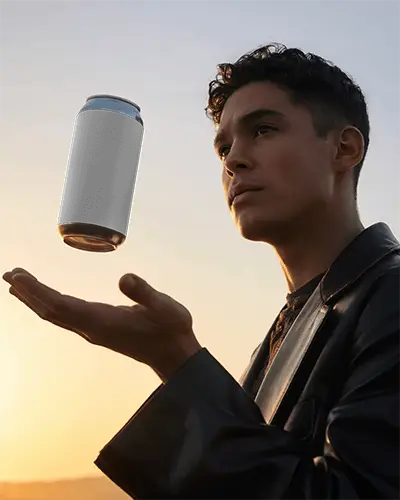 Man Holding Floating Can Mockup With Sunset Background For Beverage Packaging Design
