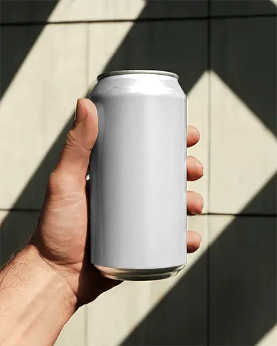 Realistic Hand Holding Can Mockup For Craft Drink Product Marketing Visuals