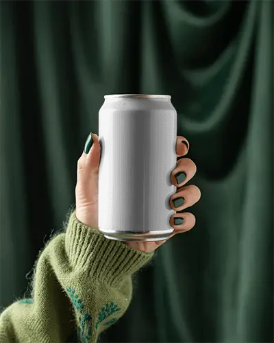 Cozy Green Can Mockup Hand In Sweater Holding Drink Against Dark Fabric Background