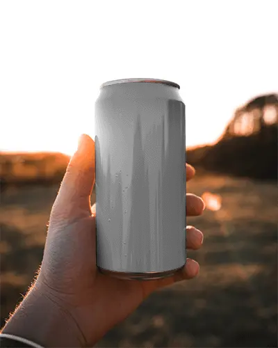 Sunset Glow Can Mockup Hand Holding Drink In Warm Evening Light Outdoors