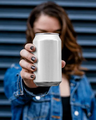 Hand Holding Blank Beverage Can Mockup For Refreshing Drink Packaging Design