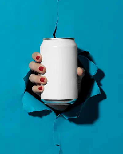Realistic Beverage Can Mockup With Ripped Background And Hand Grip Perfect For Design