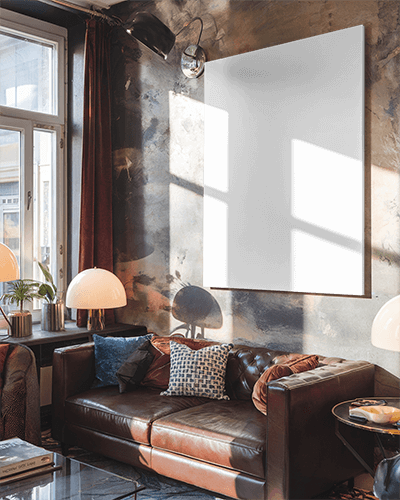 Sunlit Industrial Living Room Canvas Mockup Cozy Leather Sofa And Textured Walls With Soft Warm Lighting Modern And Inviting Ambience
